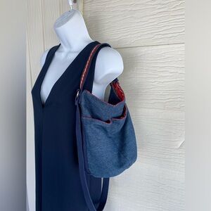 dark denim cross body and shoulder carry bag